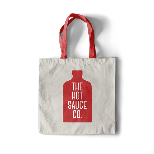 "Red 'The Hot Sauce Co.' Logo Canvas Tote Bag on clean white background